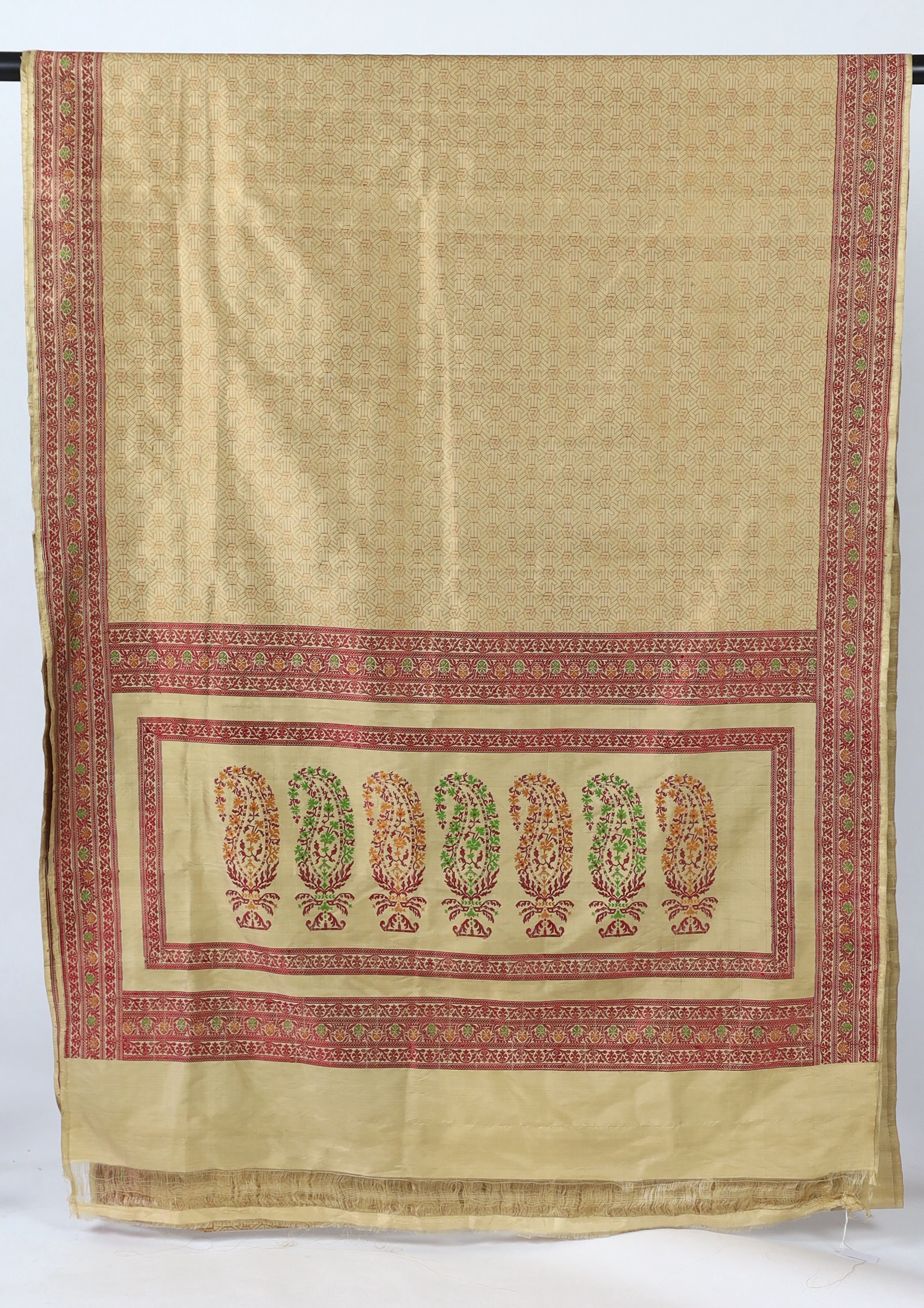 An Indian Varansi, 1980’s, hand woven silk sari by Mohammad Jafar Ali, woven in traditional style as a wedding sari, unused, 620cm long, 115cm wide, comes with provenance